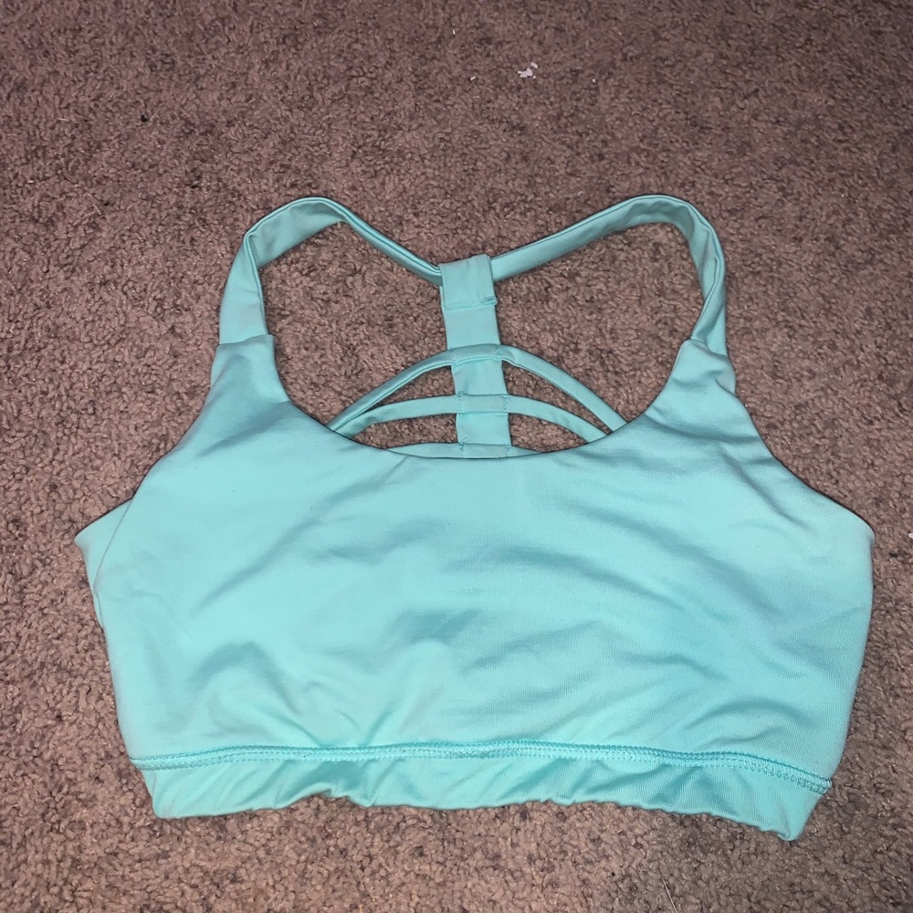 Teal strappy sports bra